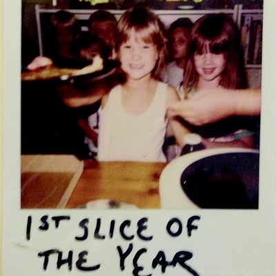 student being served a slice of pizza